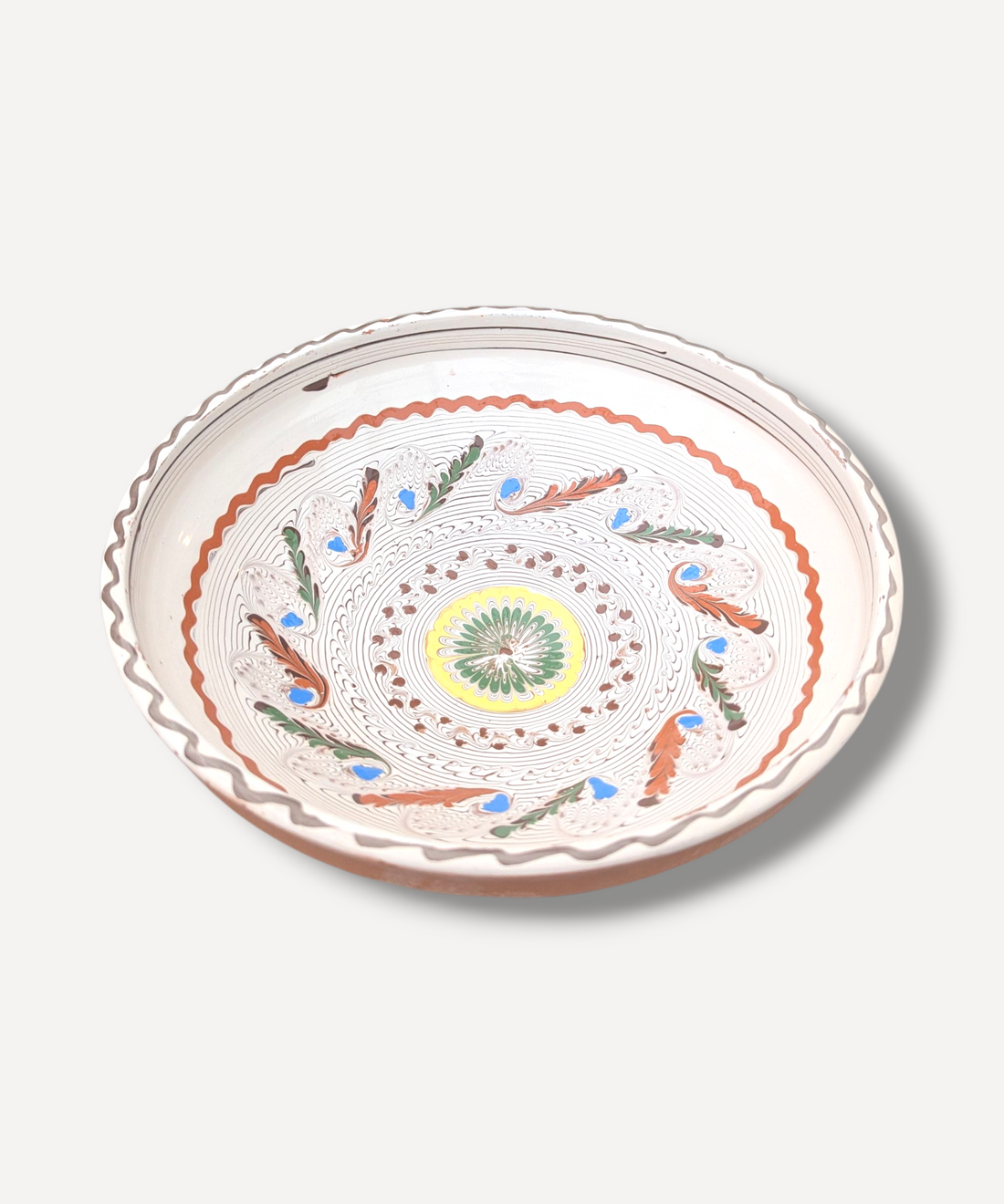 Decorative bowl with a circular pattern on a white background