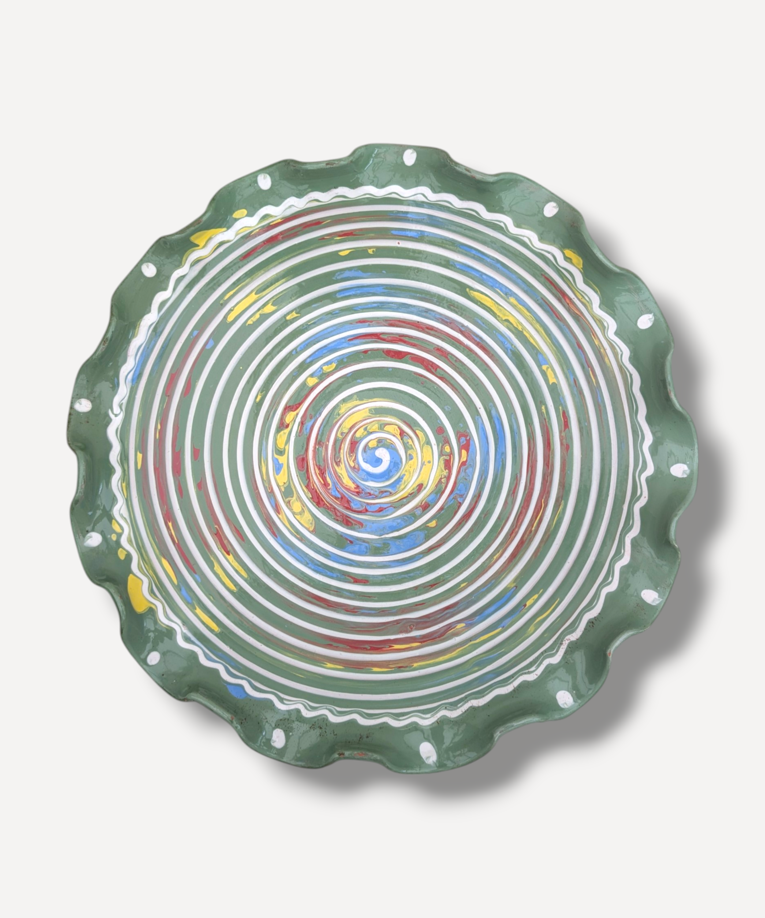Decorative plate with concentric circle pattern on a white background
