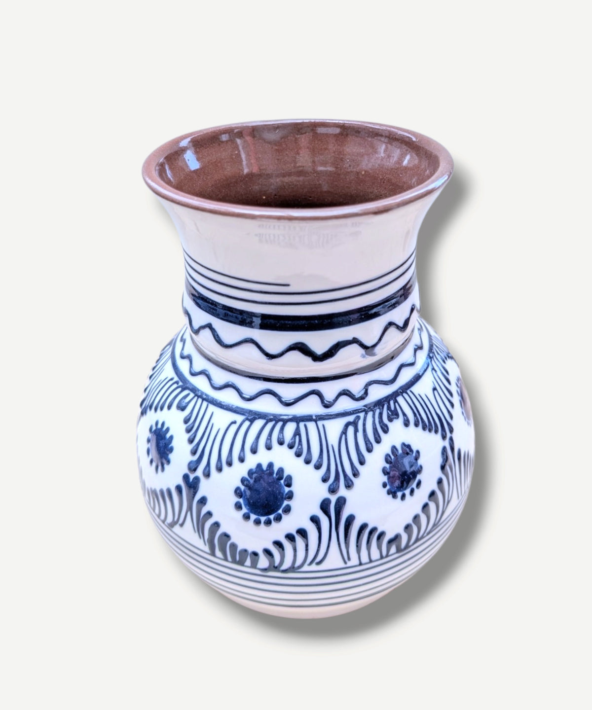 Casa De Folklore Handmade white Romanian earthenware vase with cobalt-blue wavy lines and dotted motifs and a brown interior.