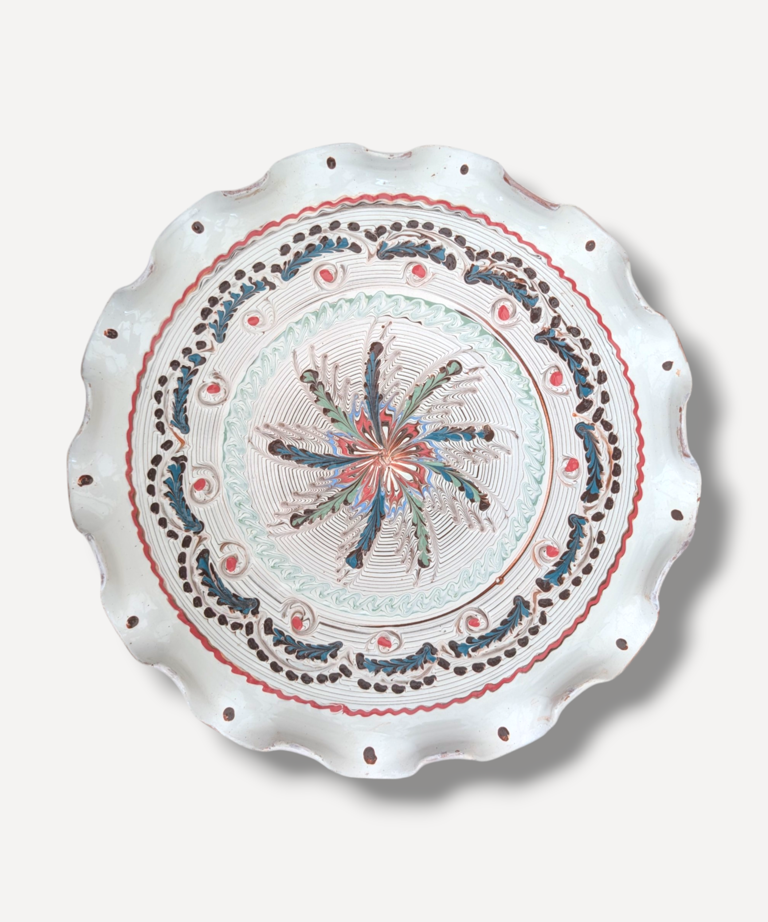 Handmade Horezu ceramic sharing platter with floral folk motif and scalloped ivory edge