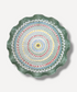 Decorative plate with colorful circular pattern on a white background