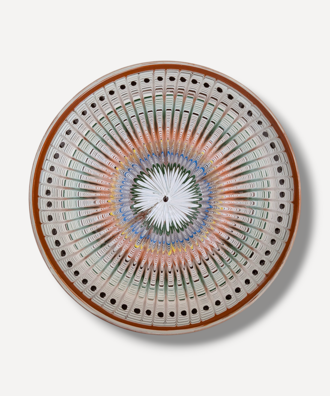 Hand decorated Romanian ceramic serving platter with feathered radial folk pattern