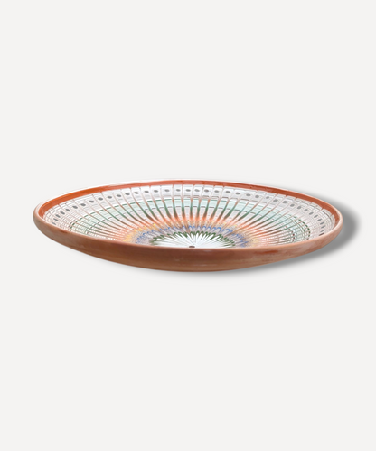 Hand decorated Romanian ceramic serving platter side view