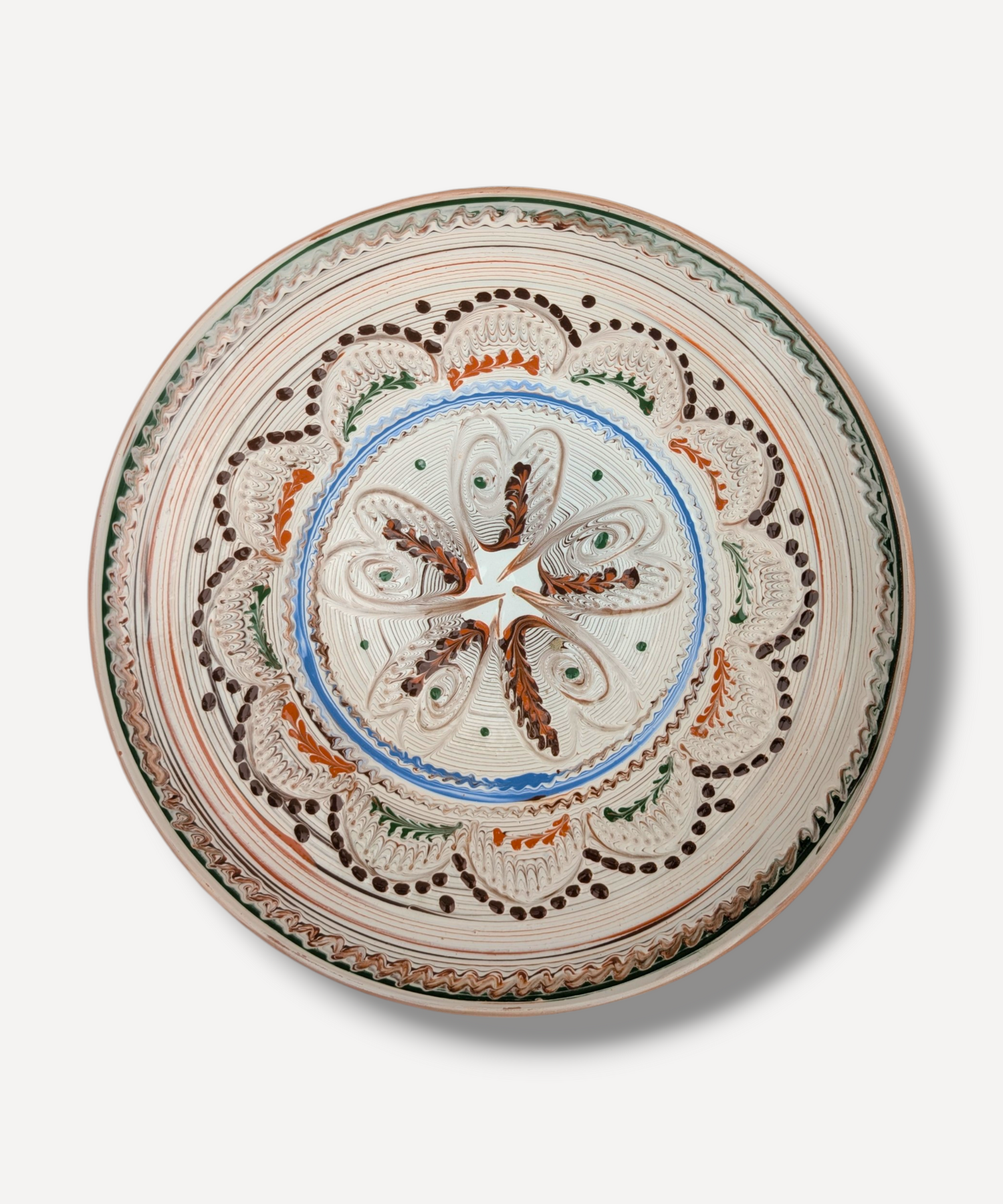 Hand decorated Romanian ceramic platter with floral star folk motif and terracotta border