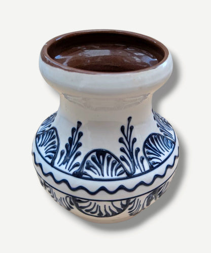 Handmade white Romanian earthenware vase with black floral motifs, a rounded body and a sculptural narrow waist. By Casa De Folklore 