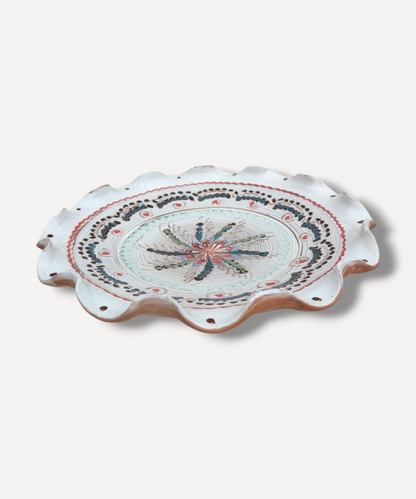 Handmade Horezu ceramic sharing platter with floral folk motif and scalloped ivory edge