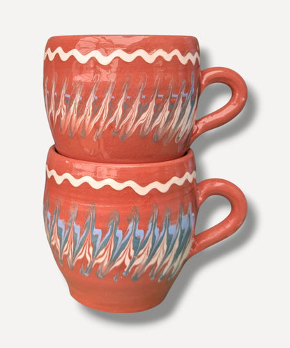 Terracotta handmade ceramic mug with blue and ivory Romanian folk decoration