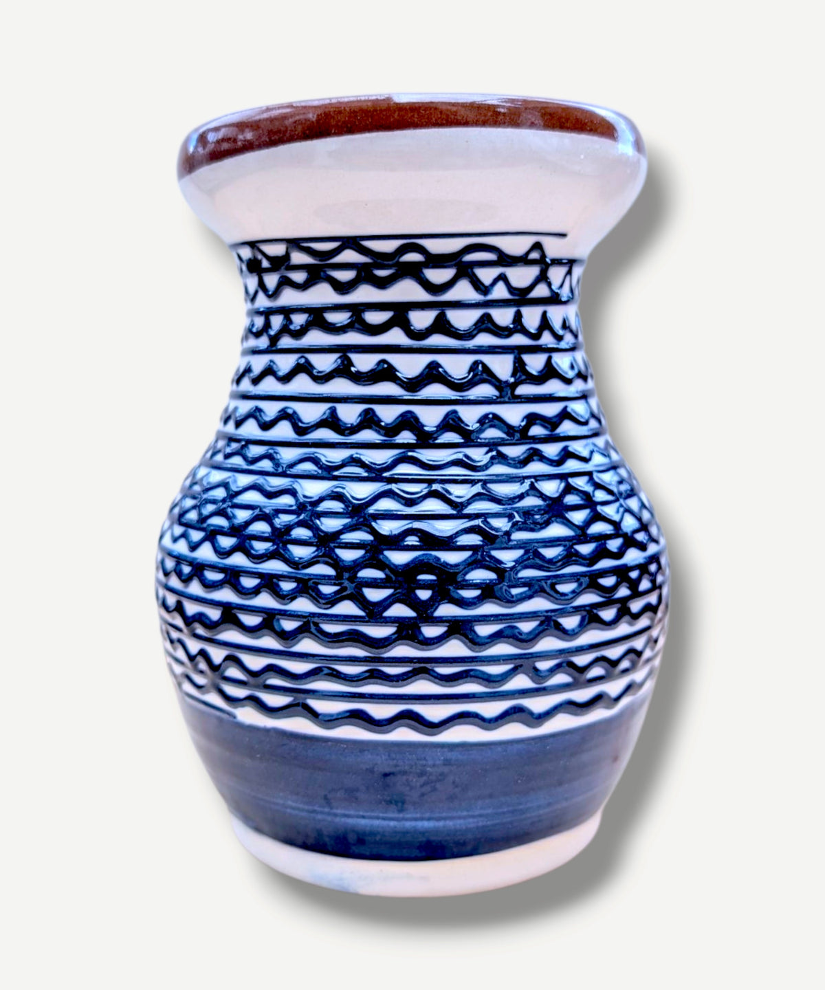 Handmade white Romanian earthenware vase with cobalt-blue geometric waves, 