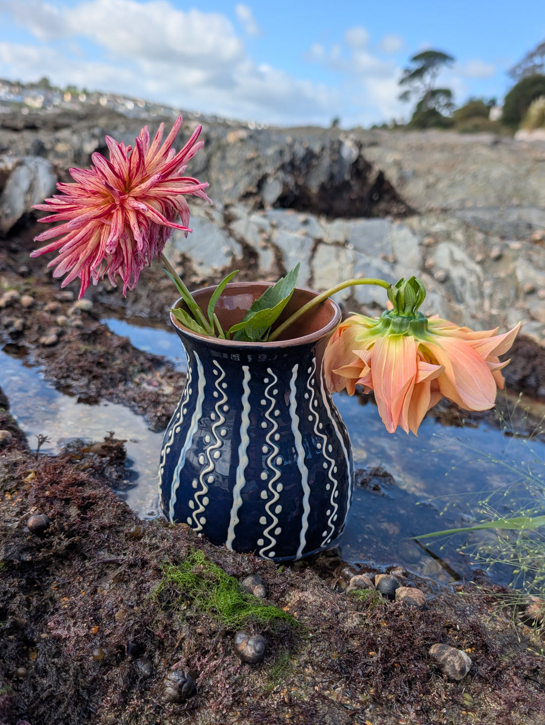 Handmade cobalt-blue Romanian earthenware jug with ecru wavy motifs and a chocolate-brown rim from the SITAR Collection by Casa De Folklore.