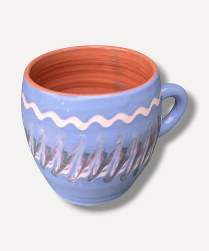 Handmade blue ceramic mug with terracotta interior and Romanian folk pottery decoration