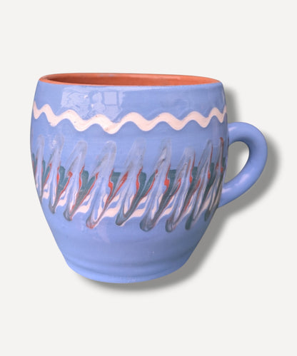 Handmade blue ceramic mug with terracotta interior and Romanian folk pottery decoration